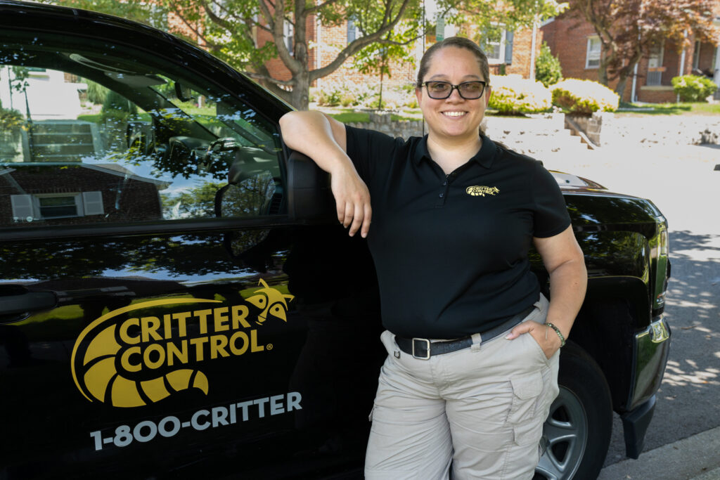 Smiling critter control truck